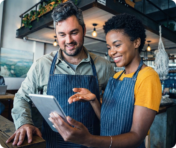 Business owners using tablet